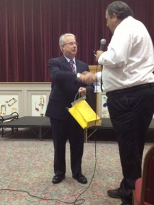 AG Sam Olens (l.) accepting some Savannah Jewish swag from JEA director Adam Solender